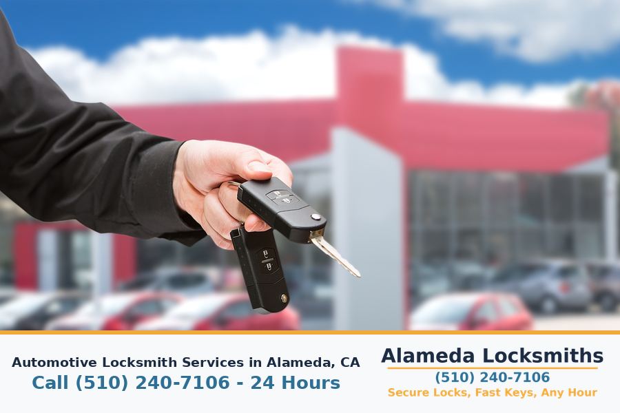 Automotive locksmith working on a car door lock