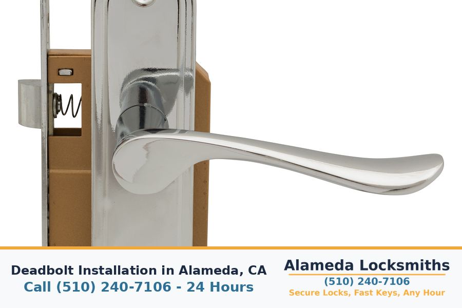 Locksmith mounting a deadbolt on a residential door