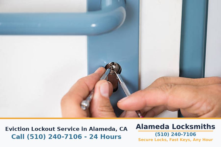 Locksmith changing locks at a rental property after an eviction