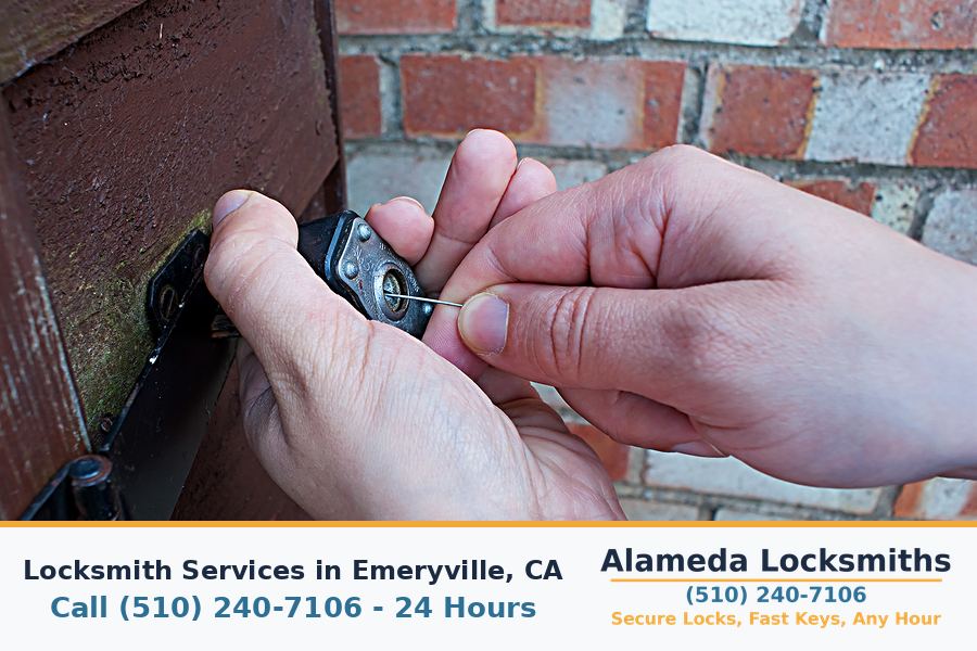 Locksmith working on a residential door lock in Emeryville, CA