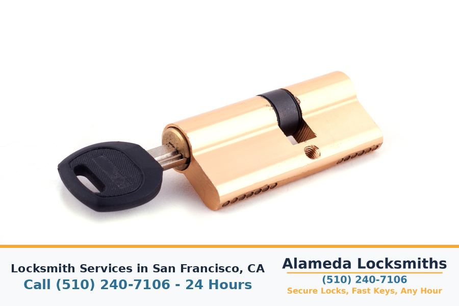 Locksmith working on a residential door lock in San Francisco, CA