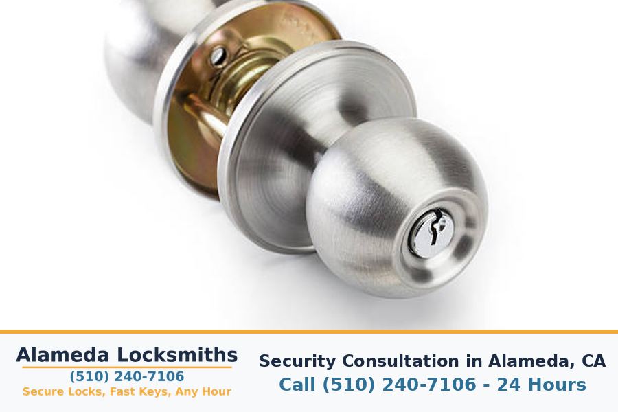 Locksmith inspecting a front door lock during a security check